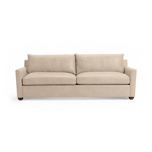 Olivia stationary sofa by Classic Home with plush fabric upholstery and modern design, shown in a cozy living room setting.