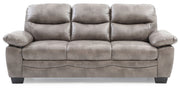 Glory Furniture Marta stationary sofa with plush cushions and modern design, shown in a cozy living room setting.