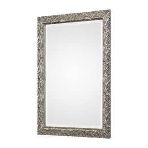 Elegant Evelina Leaves Silver Wall Mirror by Uttermost featuring a decorative frame with leaf motifs for stylish wall decor.