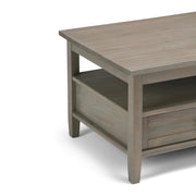 Handcrafted Warm Shaker coffee table by Simpli-Home featuring a natural wood finish and simple, elegant design.