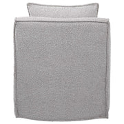 Gray Welland swivel chair by Uttermost featuring a modern design with a cushioned seat and a sturdy base.