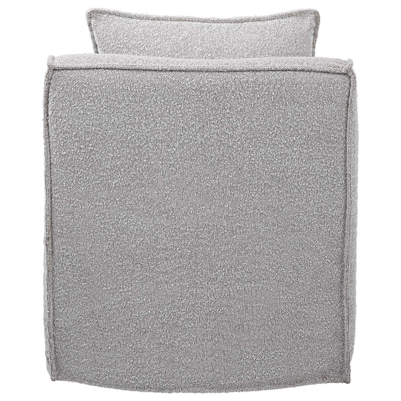 Gray Welland swivel chair by Uttermost featuring a modern design with a cushioned seat and a sturdy base.