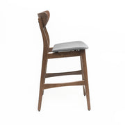 Noble House elegant counter height chair with cushioned seat, modern design, wooden frame, and comfortable upholstery.