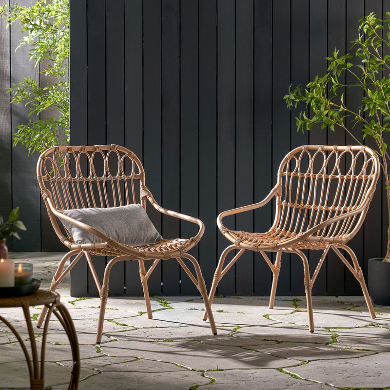 Noble House Monsoon outdoor accent chair with open weave design, featuring a stylish and comfortable patio seating option.