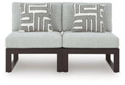 Outdoor sectional from Signature Design by Ashley Beachloft series, featuring a stylish stationary sectional for outdoor lounging.