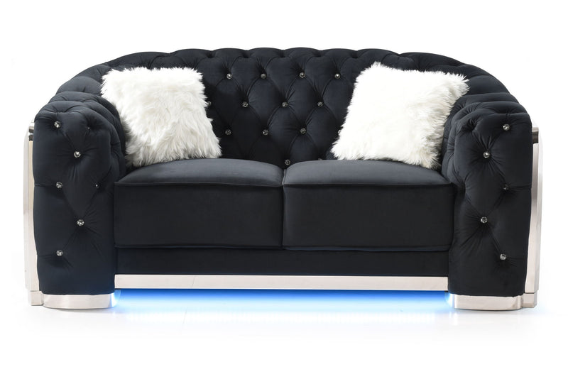 Glory Furniture stationary loveseat with flared arms, upholstered in neutral fabric, shown in a cozy living room setting.