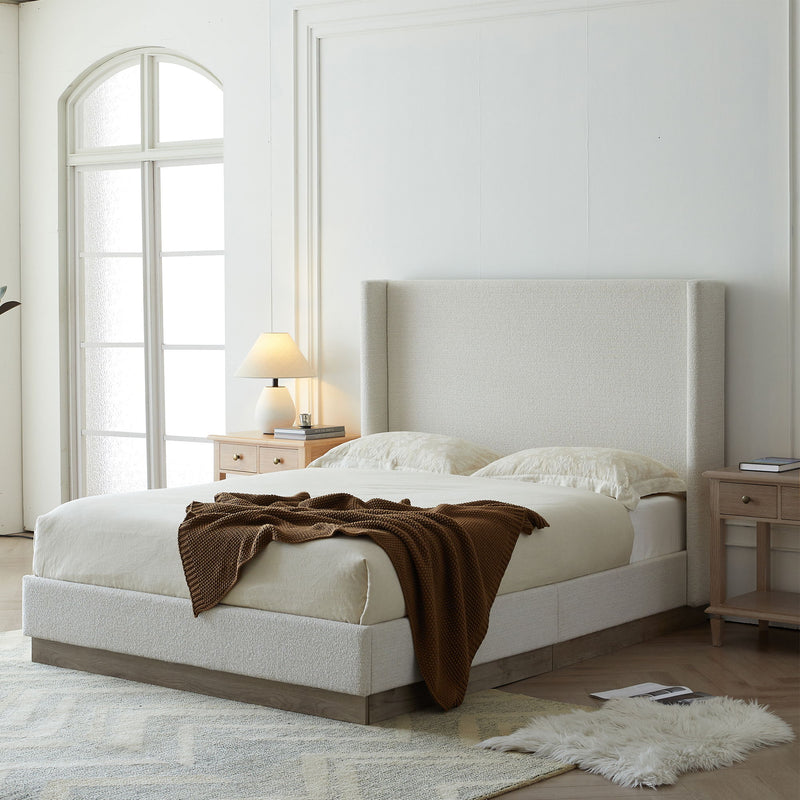House & Home Furniture Hale upholstered wingback bed with padded headboard and fabric upholstery, shown in a modern bedroom setting.