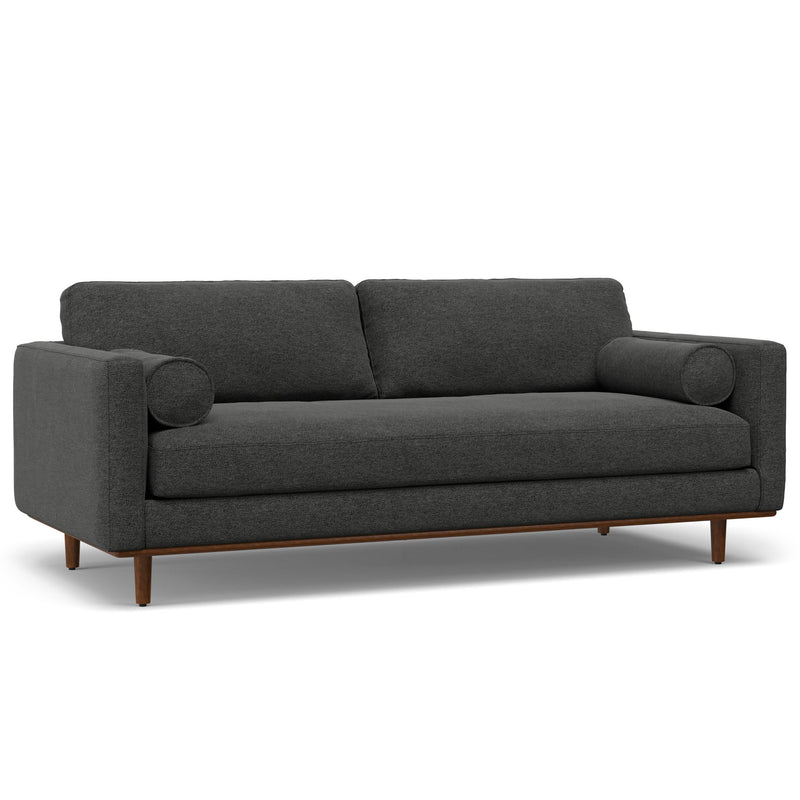Simpli-Home Morrison upholstered stationary sofa with plush fabric and wide armrests, shown in a cozy living room setting.