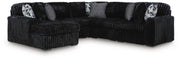 Signature Design by Ashley Midnight-Madness stationary sectional with plush cushions and dark fabric upholstery.