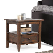 Handcrafted Warm Shaker coffee table by Simpli-Home with a wooden finish, featuring a simple rectangular design and sturdy legs.