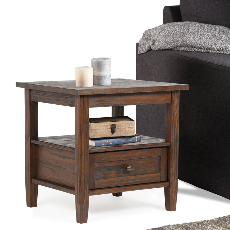 Handcrafted Warm Shaker coffee table by Simpli-Home with a wooden finish, featuring a simple rectangular design and sturdy legs.