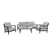 Life Outside 4-piece outdoor conversation set with chairs, bench sofa, tables, and Sunbrella cushions in a cozy patio setting.