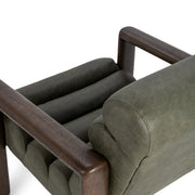 Classic Home Dahlia accent chair with cushioned seat and floral patterned upholstery in a cozy living room setting.