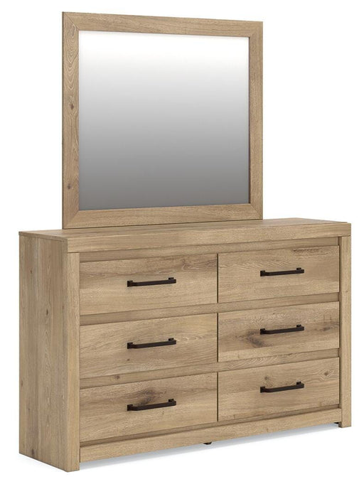 Benchcraft® Brozmont dresser with sleek wood finish and multiple drawers, ideal for bedroom storage and organization.