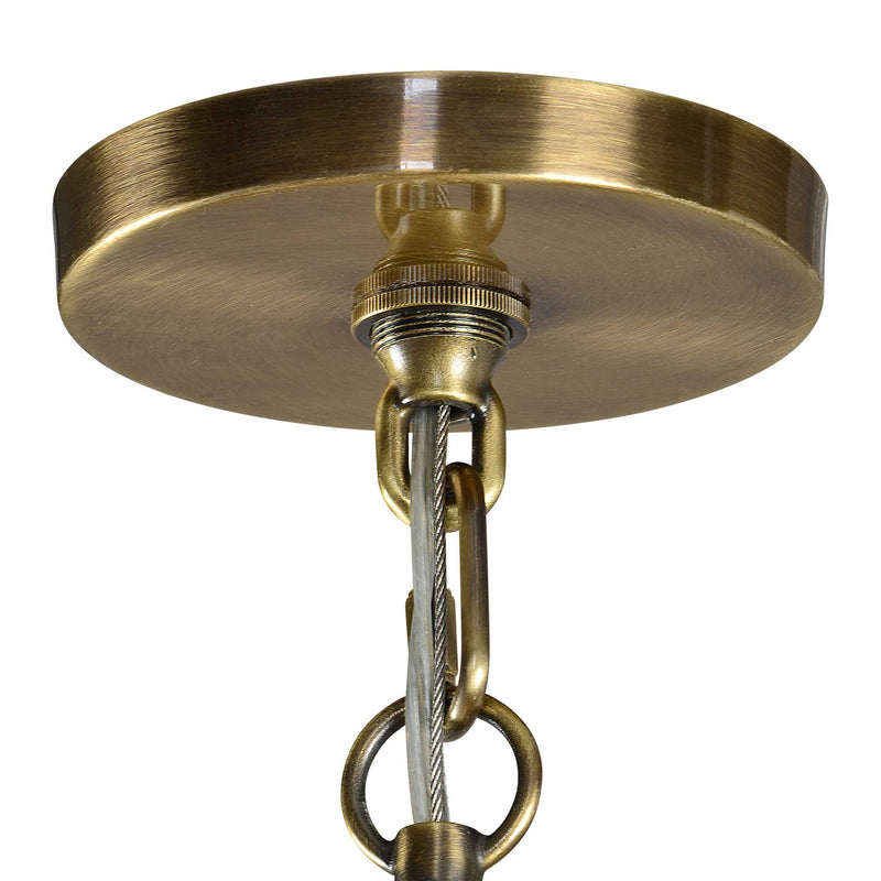 Uttermost Marinot 12-light gold chandelier with elegant curved arms and modern design, hanging from a ceiling with a minimalist ambiance.