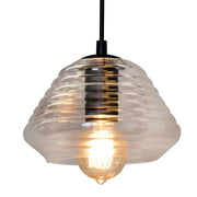Lumi Source Triangle Industrial Pendant Light with clear glass shade and geometric design, hanging from a ceiling fixture.
