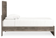 Signature Design by Ashley Ralinksi panel bed with a modern wooden frame and sleek headboard for stylish bedroom decor.