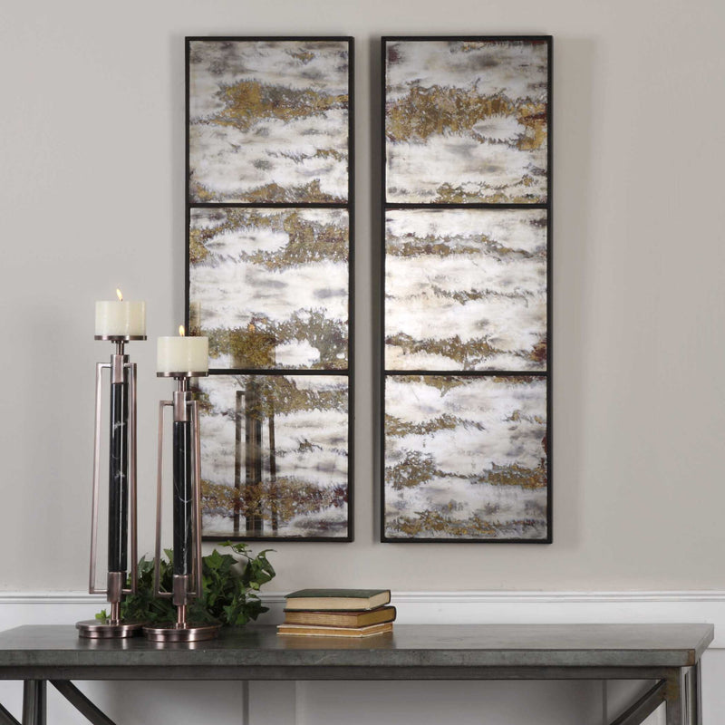 Pair of black Rahila antiqued wall mirrors by Uttermost, featuring vintage-inspired decorative wall decor with ornate frames.