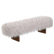 Long-haired faux wool upholstered bench in brown and beige with wooden legs, ideal for seating or accent decor.