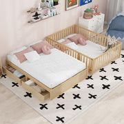 DreamHaus storage daybed with fence guardrails and two drawers, convertible into a separate floor bed and daybed.