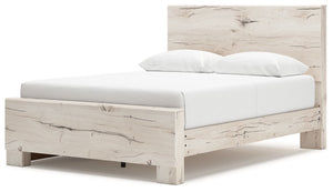 Signature Design by Ashley Lawroy panel bed with built-in storage drawers, featuring a modern wood finish and sleek design.