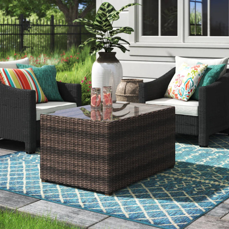 Stylish coffee table from LSI Patio Furniture with a modern design, featuring a wooden surface and sturdy metal legs.