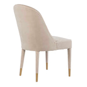 Pair of Uttermost Brie armless chairs from the chair set, featuring sleek design and neutral upholstery.
