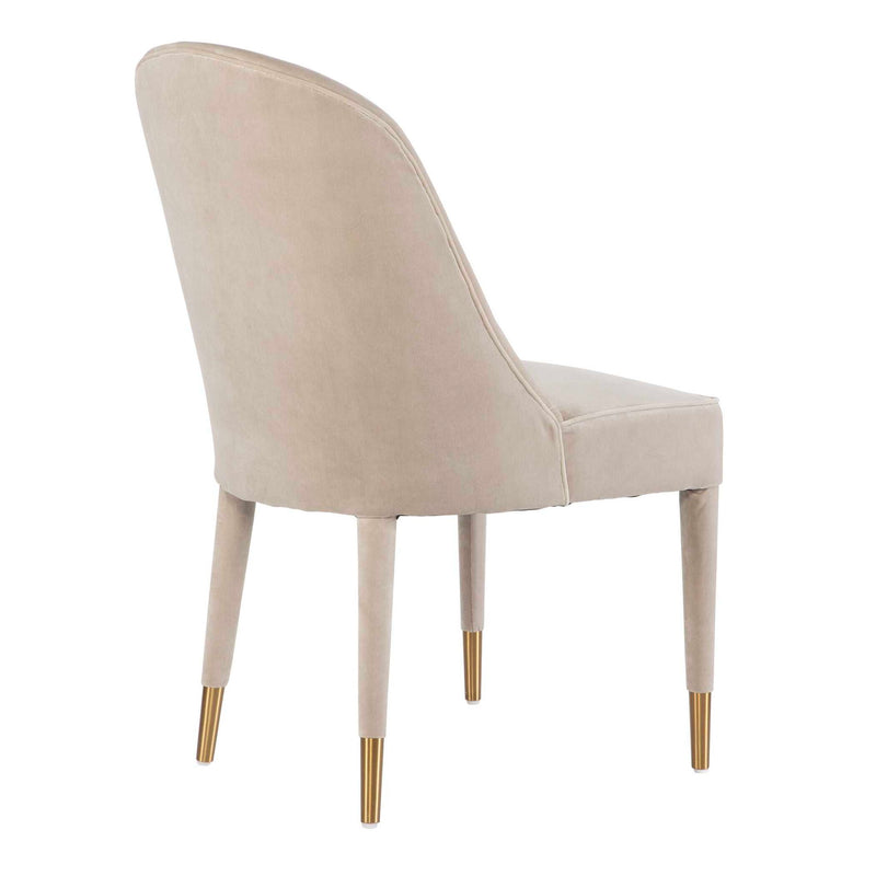 Pair of Uttermost Brie armless chairs from the chair set, featuring sleek design and neutral upholstery.