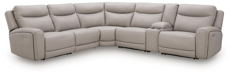 Benchcraft® Gravier reclining sectional with plush cushions and modern design, shown in a spacious living room setting.