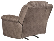 Signature Design by Ashley Stoneland rocker recliner with cushioned seat and wooden armrests, in a cozy living room setting.