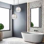 Uttermost Mimas gold globe pendant light, modern pendant lighting fixture with a sleek spherical design for stylish interior decor.