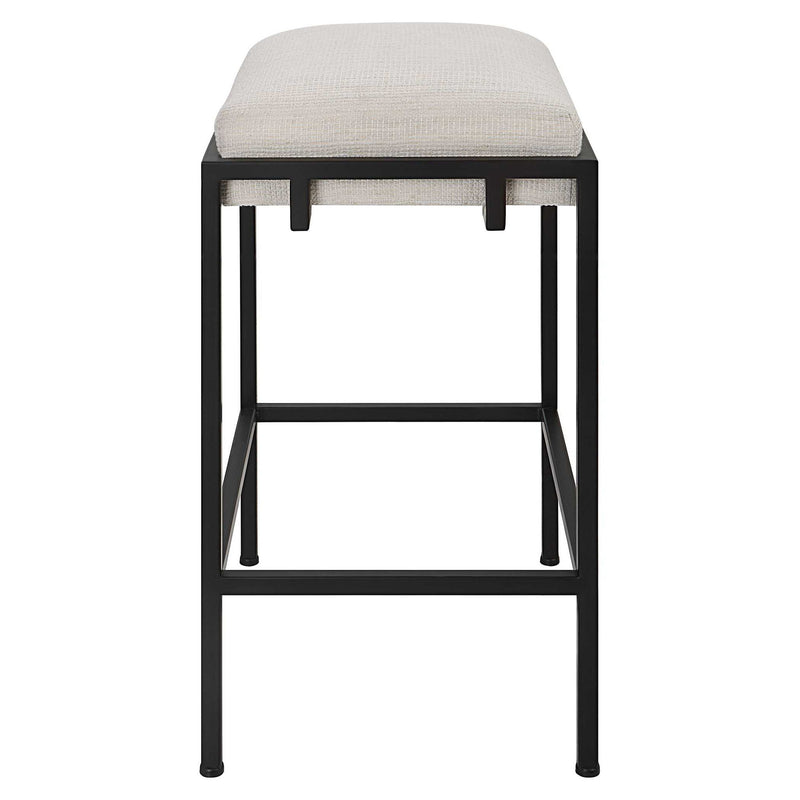 Uttermost Paradox white counter stool with sleek design and wooden legs, suitable for kitchen or bar area.