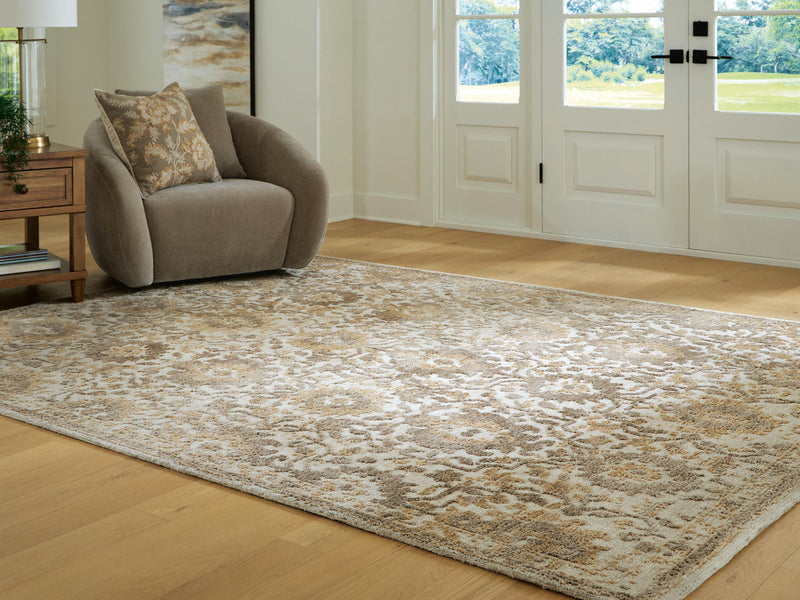 Signature Design by Ashley Sableridge area rug with geometric pattern in neutral tones, perfect for living room or bedroom decor.