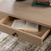 Classic Home Karl extendable coastal drift writing desk with sleek wood finish and adjustable features.
