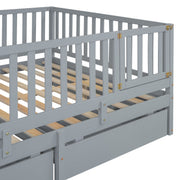 DreamHaus storage daybed with fence guardrails and two drawers, split into independent floor bed and daybed, in a cozy bedroom setting.