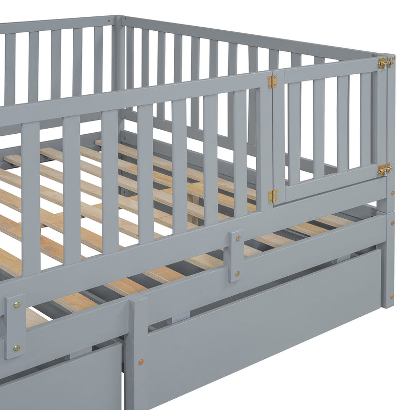 DreamHaus storage daybed with fence guardrails and two drawers, split into independent floor bed and daybed, in a cozy bedroom setting.