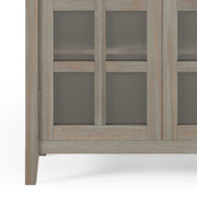 Handcrafted medium Acadian accent storage cabinet by Simpli-Home with wooden finish and shelves, ideal for living room or hallway.