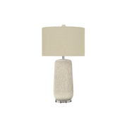 Contemporary 8th Street ceramic and resin cream table lamp with a sleek, modern design, perfect for stylish home lighting.