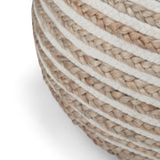 Simpli-Home Yolanda round accent pouf in natural fabric, showing a soft, plush cushion suitable for seating or decoration.