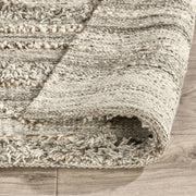 Classic Home Fallon indoor/outdoor rug with geometric pattern, suitable for both indoor and outdoor spaces, in neutral tones.