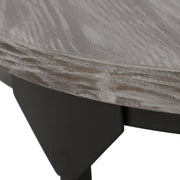 Gray Noble House coffee table with wood-patterned tabletop and black iron frame, showcasing modern design and sturdy construction.