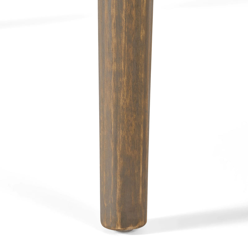 Modern Stamford outdoor dining table by Noble House with a sleek design, featuring a spacious surface and sturdy legs.