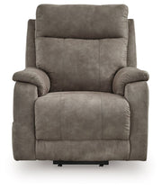 Signature Design by Ashley Crestmeade Power Lift Recliner in plush upholstery with a supportive back and armrests.