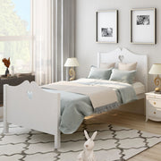 DreamHaus platform bed with slat support, featuring a headboard and footboard, shown in a modern bedroom setting.