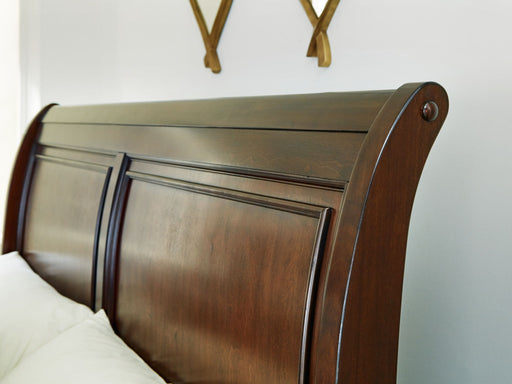 Trellington - Queen Sleigh Storage Bed - Brown - R&R Furniture Gallery (Fountain Valley, CA)