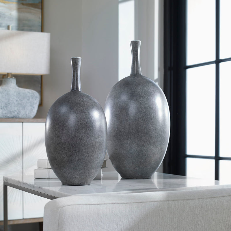 Set of two black Riordan modern vases by Uttermost, featuring sleek, minimalist design perfect for contemporary home decor.