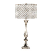 Lumi Source Topaz contemporary table lamp with sleek design and neutral-colored shade on a wooden side table.