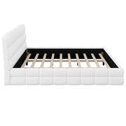 Dreamland upholstered platform bed with a padded headboard, featuring a modern design and neutral fabric upholstery.
