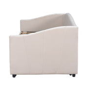 DreamHaus upholstered daybed sofa bed with trundle and wood slat base, featuring plush fabric and convertible design for versatile sleeping options.