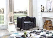 Contemporary sloped armchair by Glory Furniture with plush fabric upholstery and modern design, shown in a stylish living room setting.